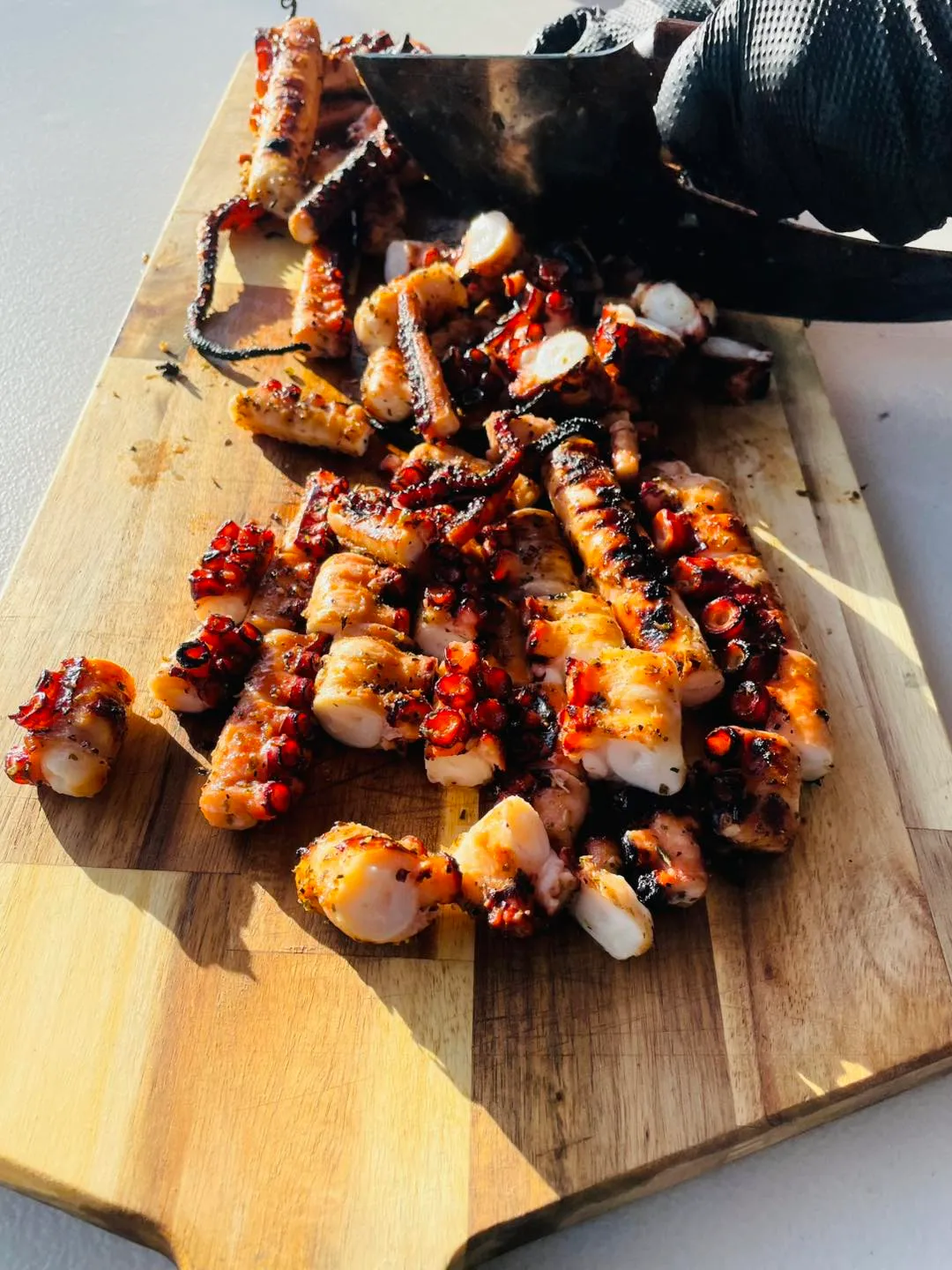 Charcoal-roasted octopus prepared over open flame