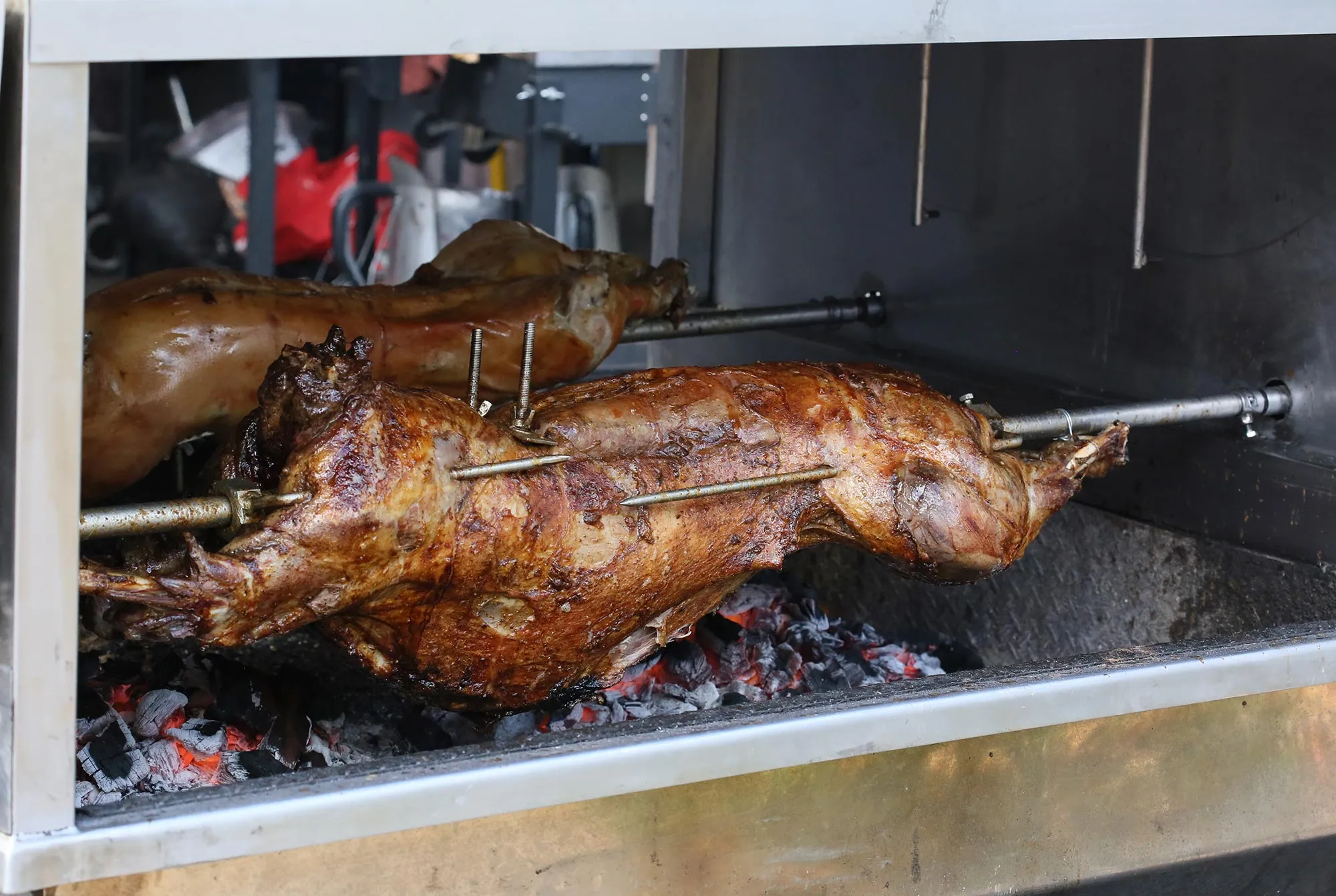 Charcoal spit roast catering at an outdoor Adelaide event